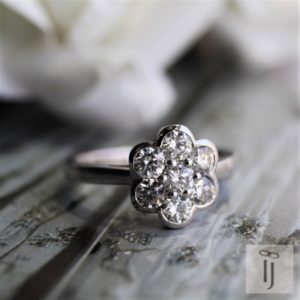 Flower cluster diamond engagement ring
